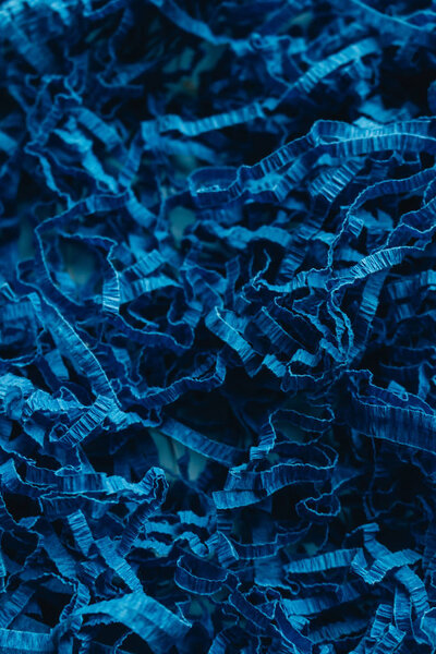 macro photo of blue paper decor material