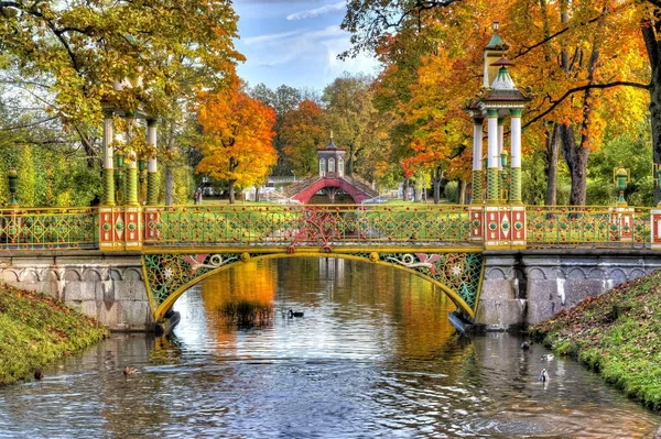 Chinese bridge during golden fall (mellow autumn) in Alexander park, Pushkin, Saint Petersburg, Russia