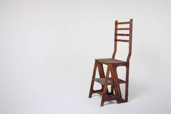 unusual wooden chair on a white background