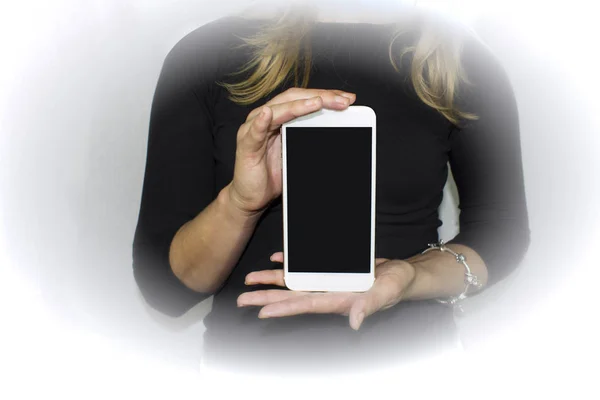 Woman Dark Dress Offering Phone Hands Black Screen Text Vignette — Stock Photo, Image