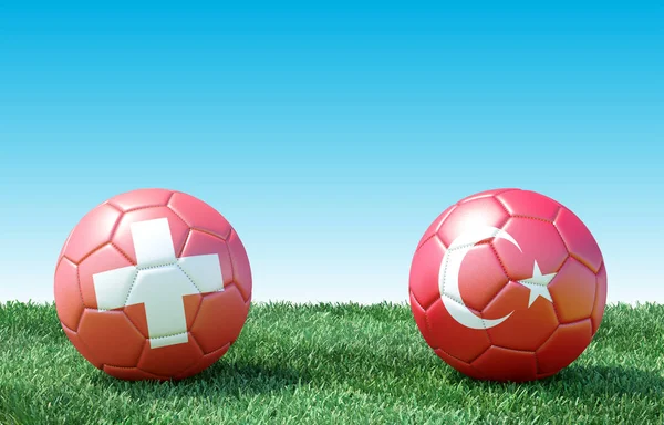 Two soccer balls in flags colors on green grass. Switzerland and Turkey. 3d image