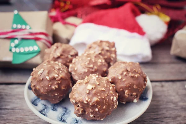 Chocolate ball with christmas decoration — Stock Photo, Image