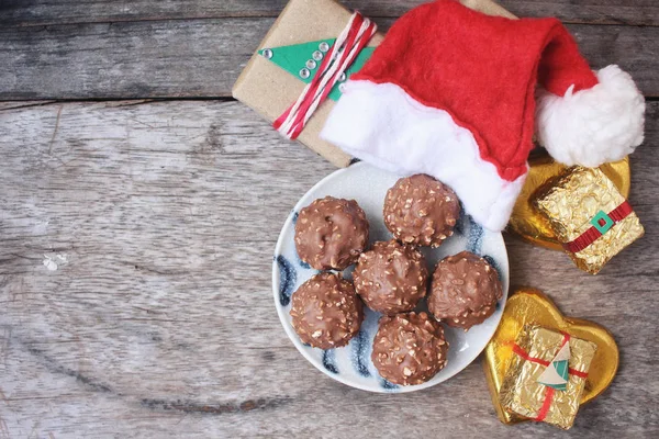 Chocolate ball with christmas decoration — Stock Photo, Image