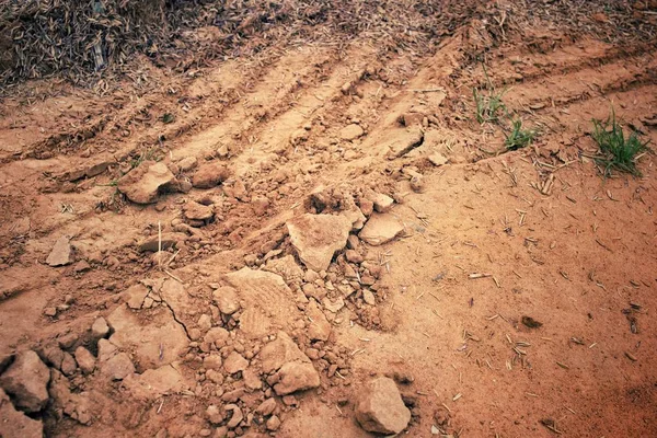 Pistes de roues sur le sol — Photo