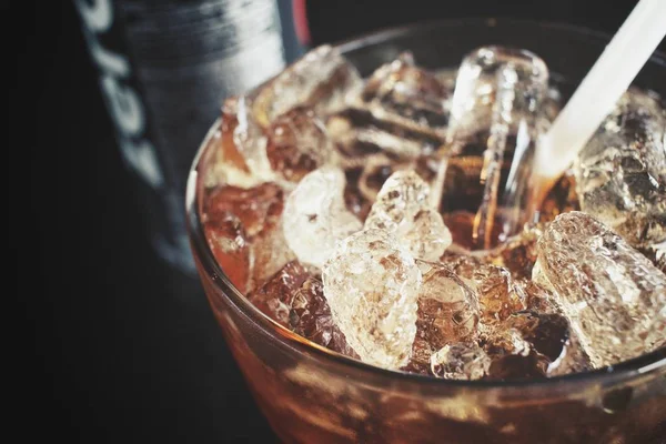 Cola with ice cubes on glass — Stock Photo, Image