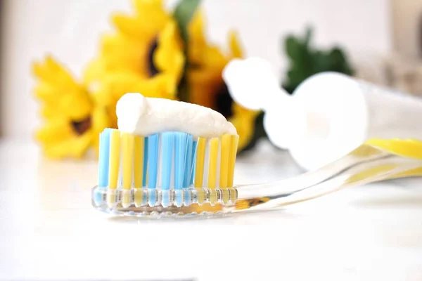 Close up of toothbrush and toothpaste — Stock Photo, Image