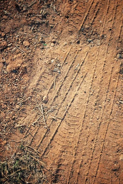 Wheel tracks on the soil — Stock Photo, Image