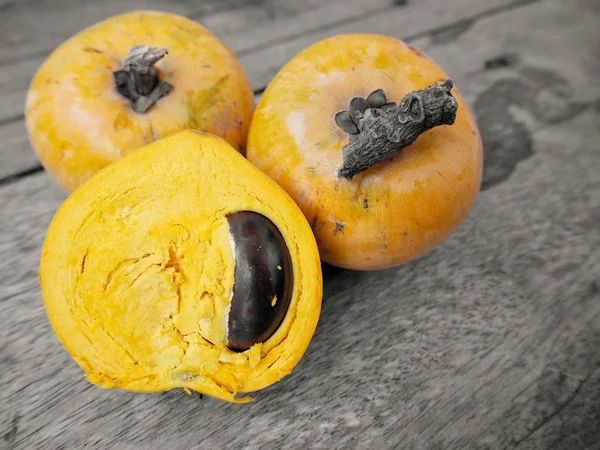 Close up of caribfruit on wood background — Stock Photo, Image