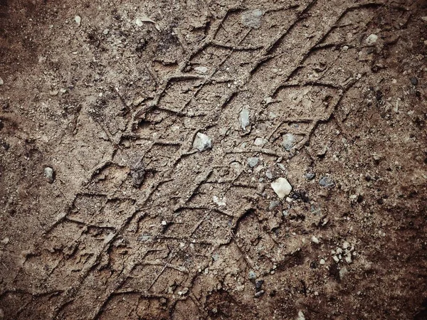 Wheel tracks on the soil — Stock Photo, Image