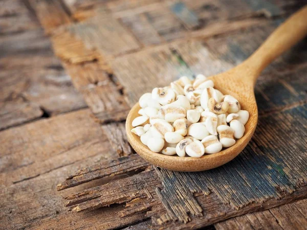 Selective Focus Millets Wooden Spoon Rustic Wooden Tabletop — Stock Photo, Image