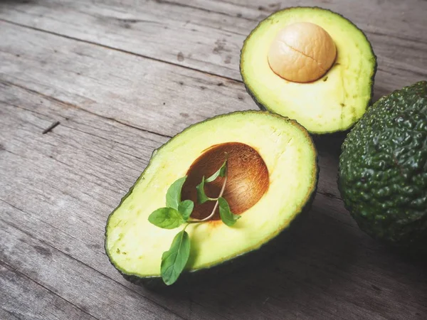 Fresh Ripe Green Avocado Pieces Old Wooden Background — Stock Photo, Image