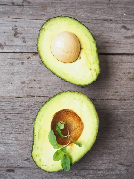 Fresh Ripe Green Avocado Pieces Old Wooden Background — Stock Photo, Image