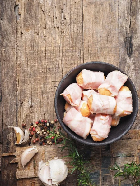 Sausages Wrapped Bacon Wooden Background — Stock Photo, Image