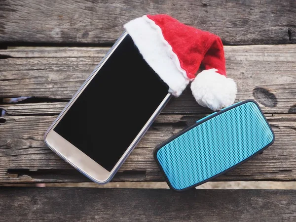 Bluetooth speaker with smart phone and christmas hat