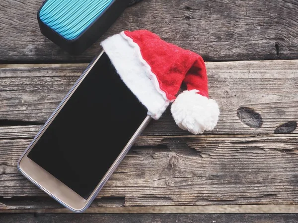 Bluetooth speaker with smart phone and christmas hat