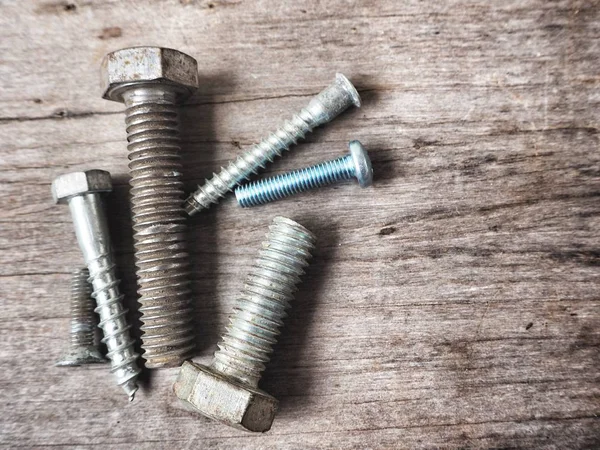 Top View Various Metal Screws Wooden Table — Stock Photo, Image