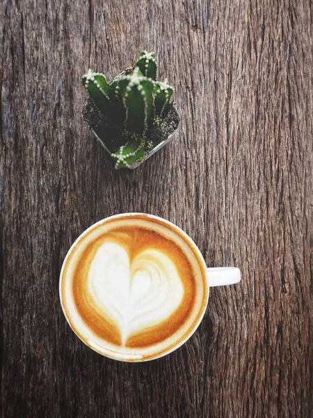 Xícara Café Arte Latte Fundo Madeira — Fotografia de Stock