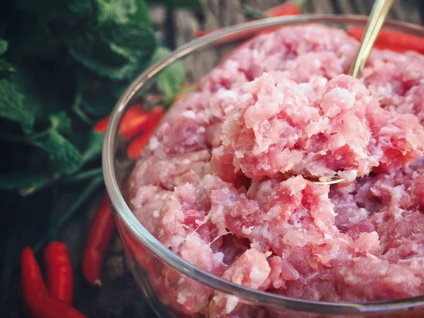 Raw minced pork on wood background — Stock Photo, Image