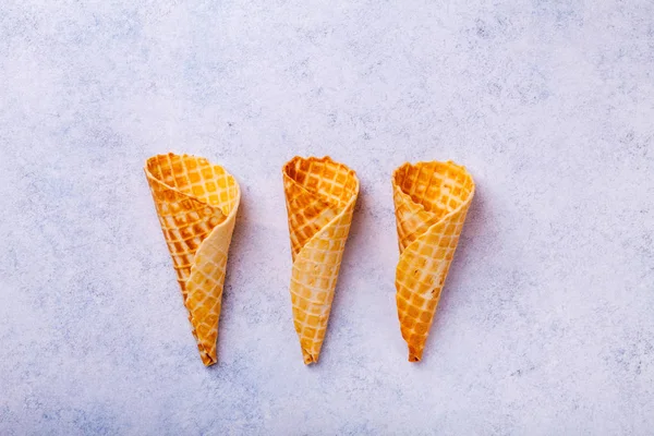 Waffle ice cream cone on a light background — Stock Photo, Image