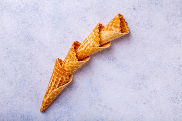 Waffle ice cream cone on a light background — Stock Photo, Image