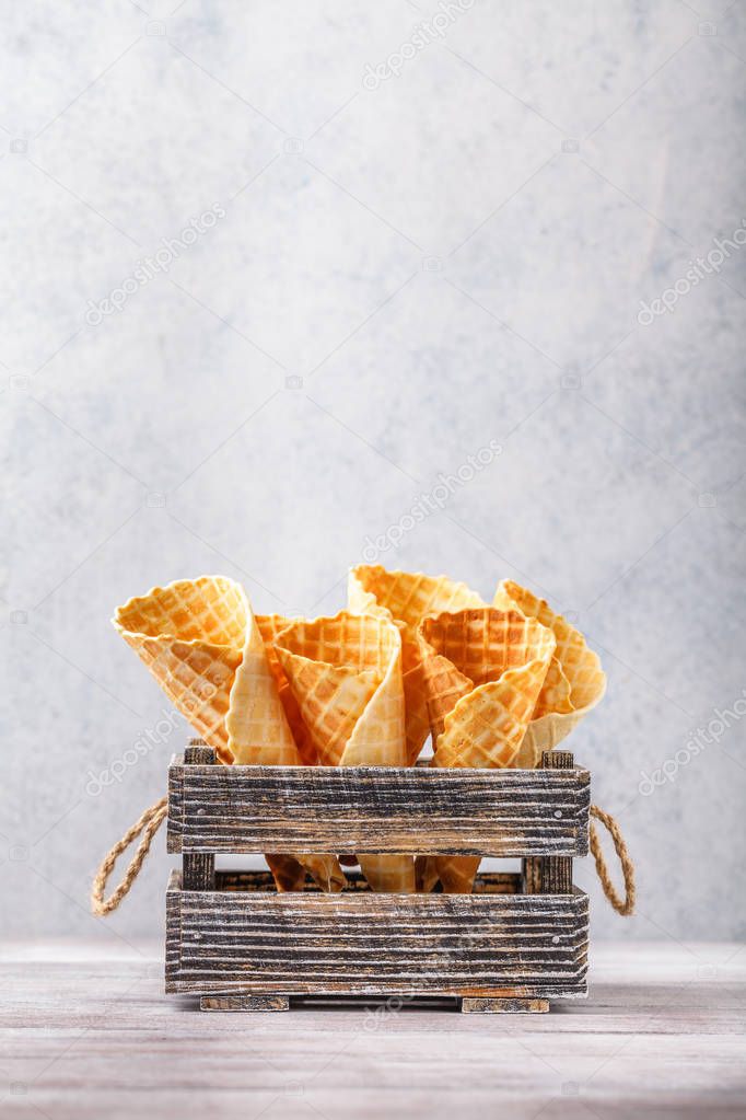 Waffle ice cream cone on a Vertically light background