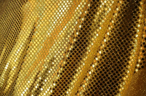 Goldener Stoff luxuriöse Textur, Nahaufnahme Farbbild — Stockfoto