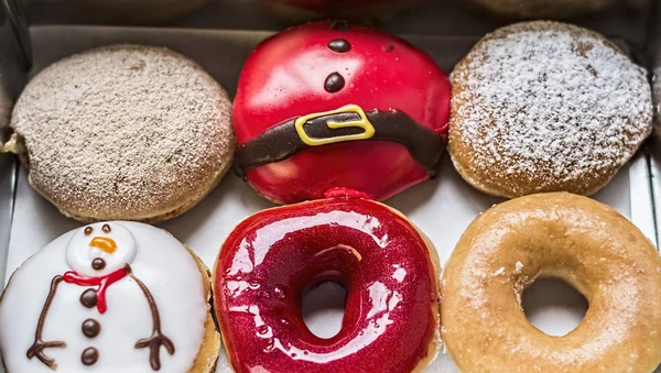 Colorful Donuts in box, Top view