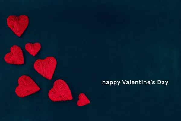 Valentines day, red hearts on a dark background , place for text — Stock Photo, Image