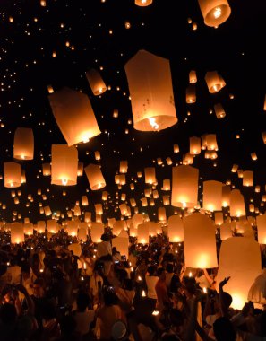 Sky lanterns festival or Yi Peng festival in Chiang Mai, Thailand clipart