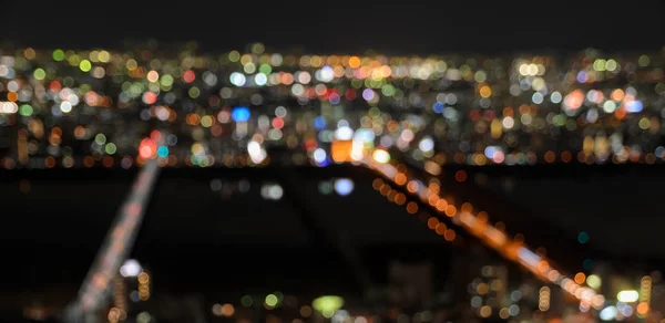 Suddig färgglada staden lights bokeh bakgrund — Stockfoto