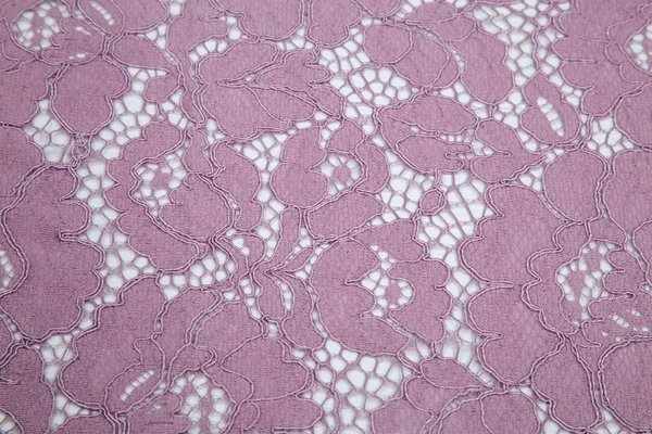 Guipure en tissu de dentelle sur fond blanc est rose pâle — Photo