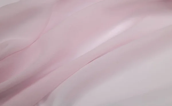 Тонкая искусственная шелковая ткань бледно-розового цвета с подкладкой — стоковое фото