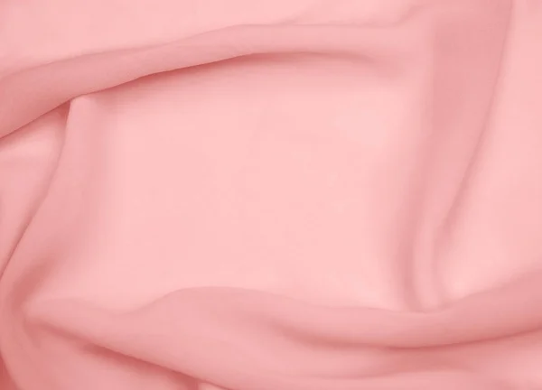 Tecido rosa claro forrado com dobras macias — Fotografia de Stock