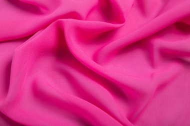 şifon kumaş parlak bol dökümlü pembe arka plan