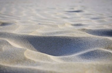 Sahil kumu farklı tonlarında şekil verme