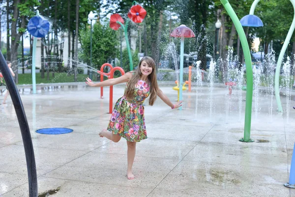 Little girl jumps on outdoors. Happy childhood concept — Stock Photo, Image