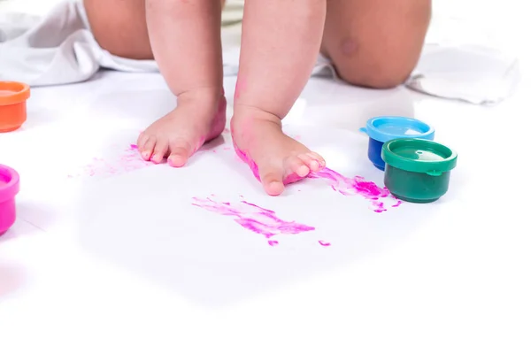 Closeup painted in bright colors feet. isolated on white background — Stock Photo, Image