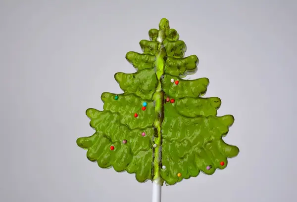 Karácsonyi Zöld Cukorka Nyalóka Egy Fehér Háttér Téli Nyaralás — Stock Fotó