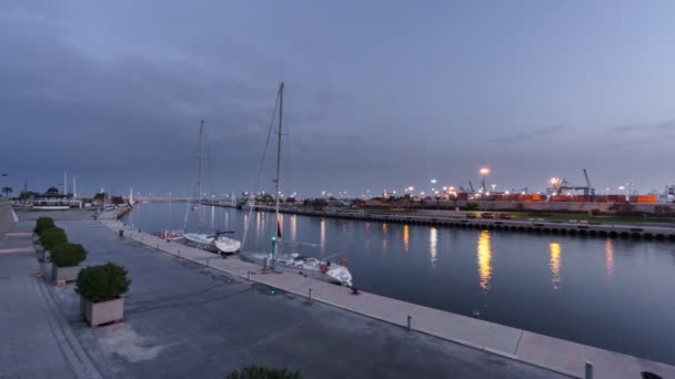 Naplemente a Valencia kikötő, idő telik el — Stock videók