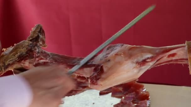 Cutting iberico ham — Stock Video