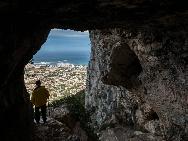 Hole of Denia with tourist from water cave — Stock Photo, Image