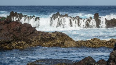Biscoitos breaking waves in Terceira