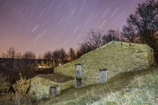 Star trail and old watermill — Stock Photo, Image