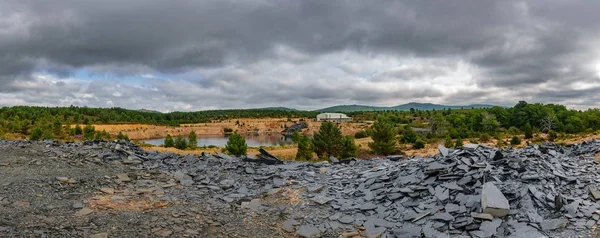 Abandoned slate mine panorama with water hole — Stock Photo, Image