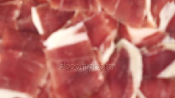 Acorn ham plate rotating closeup, top view, black background — Stock Video