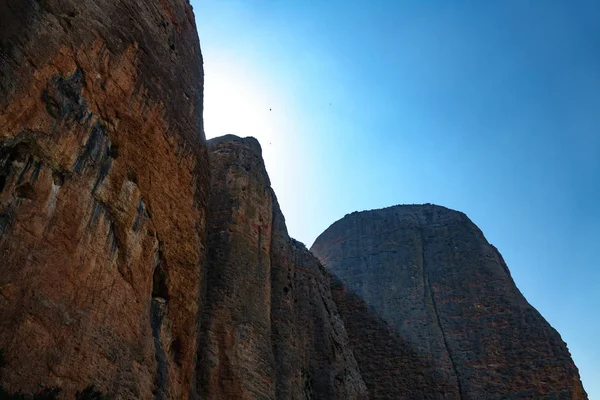 High mountain peaks and sun beam