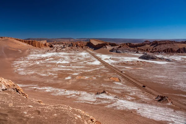 Moon valley with road crossing through it — Stock Photo, Image