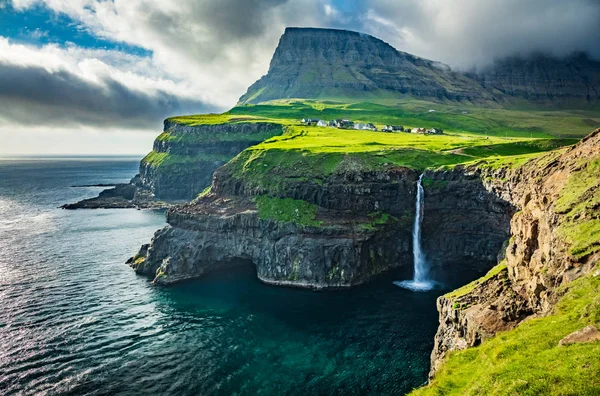 Gasadalur waterfall wide angle view at dusk — 스톡 사진