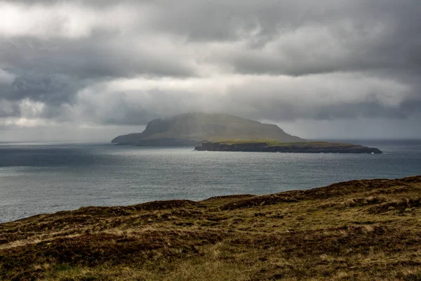 Dark cloudy and stormy sky over Faroe Islands — стокове фото