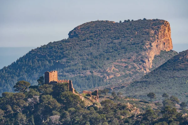 Serra castle on top of the hill with La Mola mountain — Stock Photo, Image